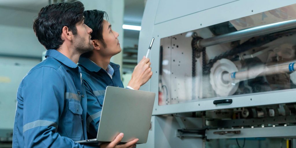 Engineering Guys in A Water Treatment Equipment Workshop